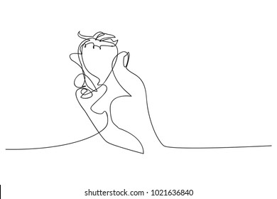 continuous line drawing of a hand holding Strawberry's vector illustration.