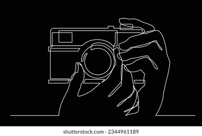 continuous line drawing of hand holding photo camera making pictures