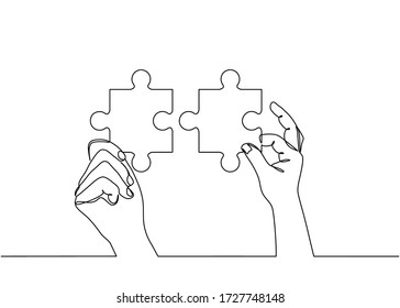 Continuous line drawing of hands solving Two Puzzle Pieces. Concept of business teamwork and integration with puzzle. Teamwork and partnership concept of two businessman isolated on white background.