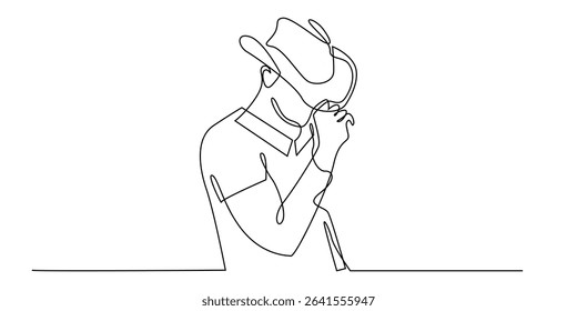 continuous line drawing of a man in a cowboy hat.young man dressed as a cowboy.single line art isolated on white background