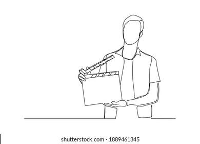 Continuous line drawing of man hold retro old classic movie board clapper. Vintage film scene taker item concept single one line art design graphic vector illustration