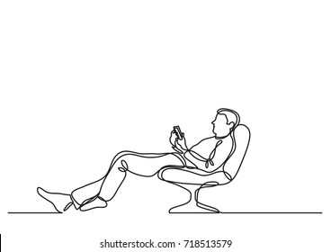 continuous line drawing of man relaxing in chair with his mobile phone