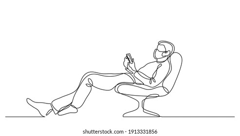 continuous line drawing of man wearing face mask relaxing in chair with his mobile phone