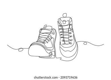 Continuous line drawing man work boots  Single one line art safety hiking boots  Vector illustration