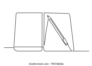 continuous line drawing notebook and pen close-up