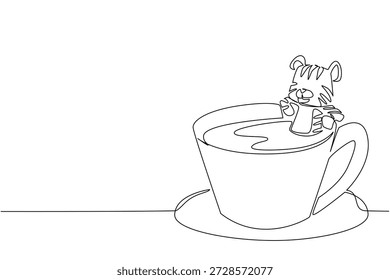 Continuous line drawing of playful cute tiger depicts giant animal soaking in coffee cup for nature concept. Simple illustration fits international wildlife day for big cat lovers and nursery print