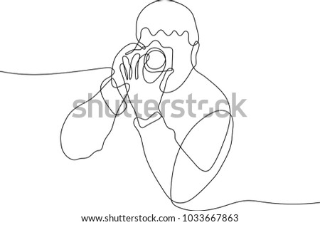 continuous line drawing of Portrait of a photographer covering his face with the camera.