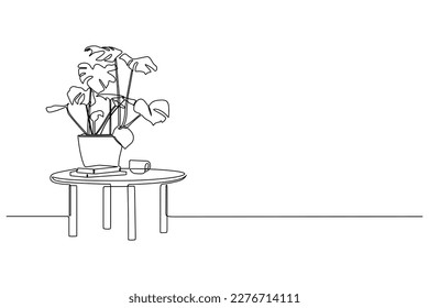 continuous line drawing of potted flower on the table