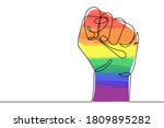 Continuous line drawing of rainbow colored strong fist raised up. Human arm in LGBT flag colors with clenched fingers, one line drawing vector illustration. Concept of gay pride, lgbt, love