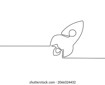 continuous line drawing of a rocket on a white background. vector illustration