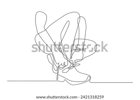 continuous line drawing of shoes.vector one line athlete wearing shoes. pose wearing shoes when playing single line sports