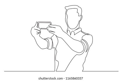 continuous line drawing of standing man making selfie with his mobile phone