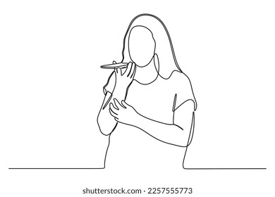 Continuous line drawing of woman talking to mobile phone
