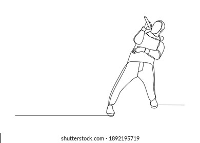 Continuous line drawing of young happy male pop singer holding microphone and singing on stage. Single one line art of musician artist performance concept design vector illustration