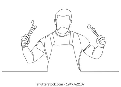 Continuous line drawing of young male mechanic pose holding set of wrench. Single one line art of man professional job profession minimalist concept. vector illustration