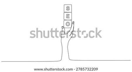 A continuous line illustration of a hand holding a dice with the word SEO written on it