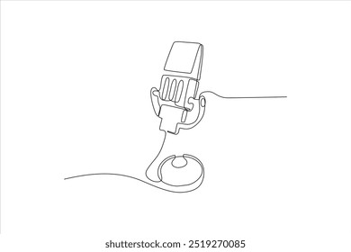 continuous line vector illustration of a mic	