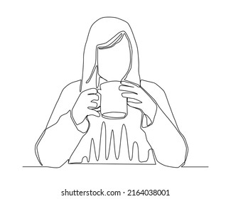Continuous line of woman in sweater using 2 hands holding hot coffee vector.