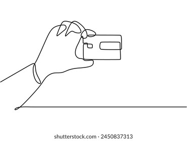 Continuous one line of Bank credit card in hand