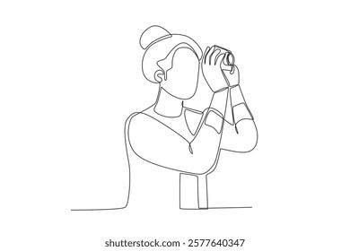 Continuous one line drawing active happy a woman who is capturing moments with a camera while traveling. Trip and holiday concept. Single line draw design vector illustration
