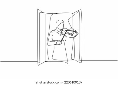 Continuous one line drawing Arab woman musician standing near window and playing violin. Female staying at home in self quarantine due to pandemic. Single line draw design vector graphic illustration