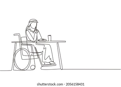 Continuous one line drawing Arabian male young wheelchair user eating food sitting at the table. Having lunch, snack in cafe. Society and disabled people. Single line draw design vector illustration