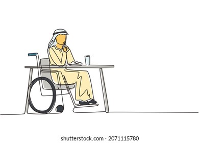 Continuous one line drawing Arabian male young wheelchair user eating food sitting at the table. Having lunch, snack in cafe. Society and disabled people. Single line draw design vector illustration