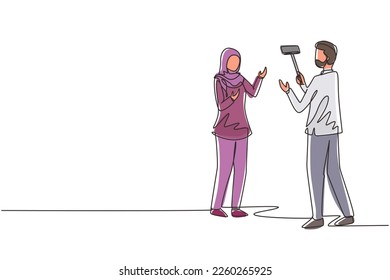 Continuous one line drawing Arabian girl makes video blog with cameraman on street. Woman blogger, journalist filming with smartphone and videographer. Single line draw design vector illustration