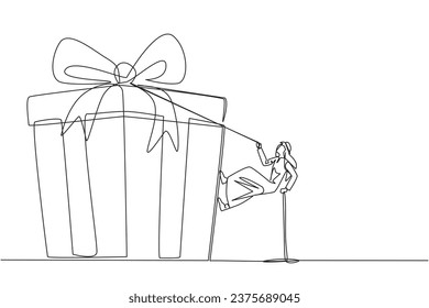 Continuous one line drawing Arabian businessman climbs gift box with rope. Struggle persistently to achieve desired reward. Hard work. Sincere work. Smart. Single line draw design vector illustration