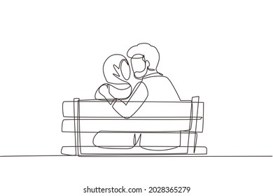 Continuous one line drawing back view Arabian couple kissing sitting on bench in park romantic scenery. Happiness guy and girl relationship in love. Single line draw design vector graphic illustration