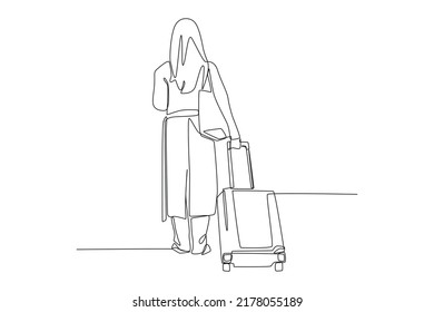Continuous one line drawing back view of girl traveler standing and waiting with carrying hold suitcase in the station. World tourism day concept. Single line draw design vector graphic illustration.