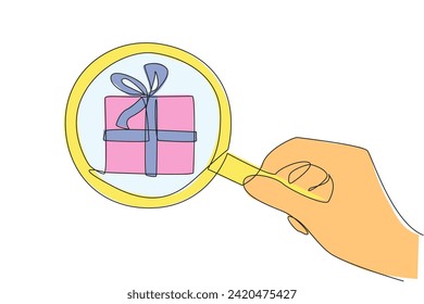 Continuous one line drawing big hand holding magnifying glass highlights gift box. Observe a gift that will be given to a business associate. Tokens of gratitude. Single line draw vector illustration