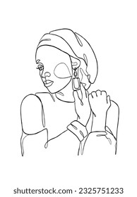 Continuous one line drawing of black woman with turban. Vector illustration.