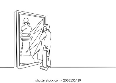 Continuous one line drawing businessman standing in front of mirror, reflecting chess king. Metaphor of confidence. Success, opportunities concept. Single line draw design vector graphic illustration