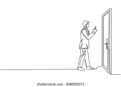 Continuous one line drawing businessman lifts key in front door  Man holding key to open office room door  Starting morning and spirit to work  Single line draw design vector graphic illustration