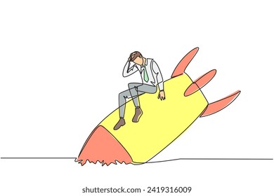Continuous one line drawing of businessman sits downcast on a swooping rocket stranded and stuck at ground level. The new business was destroyed. Unable to pay bills. Single line draw design vector