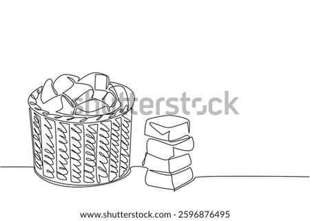 Continuous one line drawing buttermilk biscuit in rattan wicker container. Display food. Can be brought as souvenirs. National Buttermilk Biscuit Day. Single line draw design vector illustration