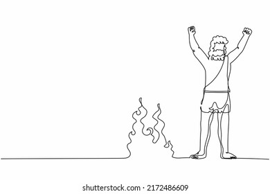 Continuous one line drawing caveman stands and raised his hands around campfire. Prehistoric man standing around bonfire. Warmth his body at night. Single line draw design vector graphic illustration
