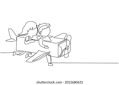 Continuous one line drawing creative kids playing as pilot with cardboard airplane. Children riding cardboard handmade airplane. Plane game pilot. Single line draw design vector graphic illustration