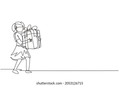 Continuous one line drawing cute little girl walking and hugging big ribbon bow wrapped gift box. Kid carries holiday gift with big red bow in her hands. Single line draw design vector illustration
