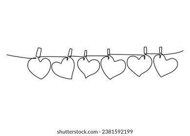 Continuous one line drawing cute heart shape paper hanged on the rope with clothesline. Romantic relationship love marriage greeting card concept. Single line draw design vector graphic illustration