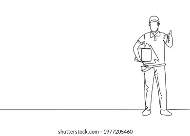 Continuous one line drawing delivery man stands with thumbs-up gesture, carrying package box that the customer has ordered to be delivered safely. Single line draw design vector graphic illustration.