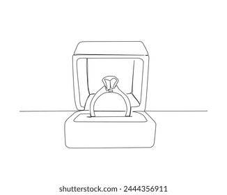 Continuous one line drawing of Diamond ring in the box. Wedding rings single outline design. Editable stroke.