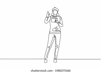 Continuous one line drawing female film director stands with a thumbs-up gesture while holding the clapperboard to prepare camera crew for shooting. Single line draw design vector graphic illustration