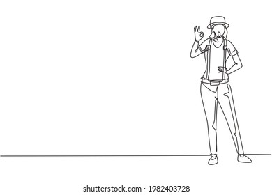 Continuous one line drawing female mime artist stands with gesture okay and white face make-up makes audience laugh with silent comedy. Great show. Single line draw design vector graphic illustration