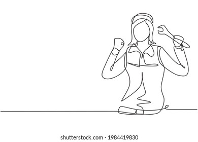 Continuous one line drawing female mechanic with celebrate gesture and holding wrench works to fix broken car engine in garage. Success business. Single line draw design vector graphic illustration