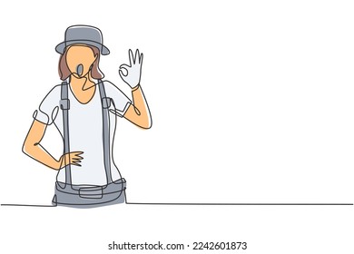Continuous one line drawing female mime artist with gesture okay and white face make-up puts on a silent motion comedy show at circus arena. Single line draw design vector graphic illustration
