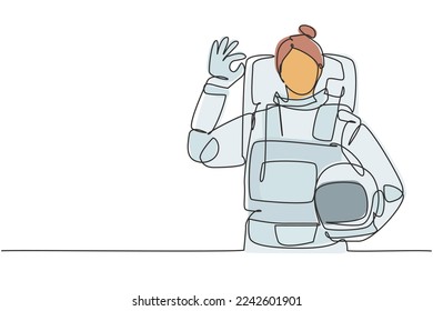 Continuous one line drawing female astronaut with gesture okay wearing spacesuits to explore outer space in search mysteries of universe. Great job. Single line draw design vector graphic illustration