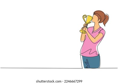 Continuous one line drawing female athlete wearing jersey kissing trophy after winning world sports competition. Proud and unforgettable moment of victory. Single line draw design vector graphic