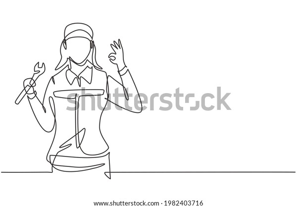 Continuous one line drawing female mechanic
with gesture okay and holding wrench works to fix broken car engine
in garage. Success business concept. Single line draw design vector
graphic
illustration